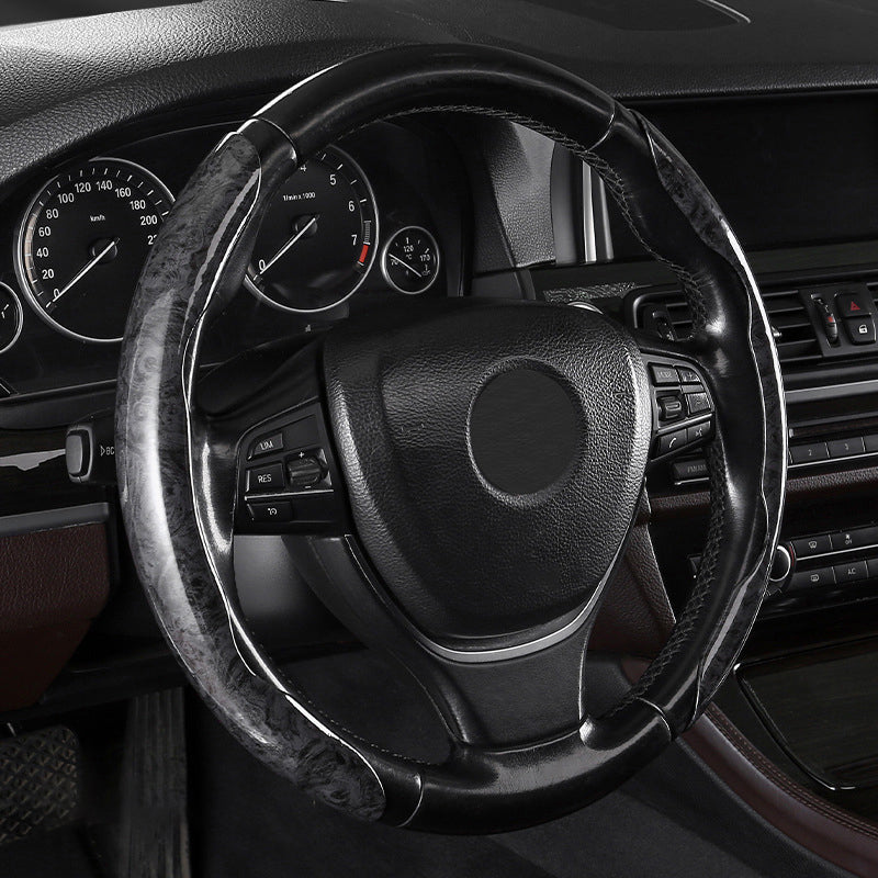 🔥Złapiesz go i pokochasz!🔥Uniwersalny, antypoślizgowy pokrowiec na kierownicę samochodową