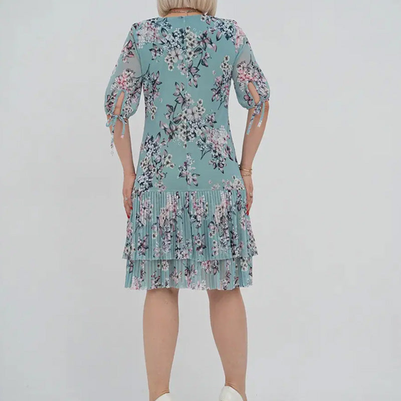 Elegancka damska sukienka plisowana z krótkim rękawem i długą spódnicą