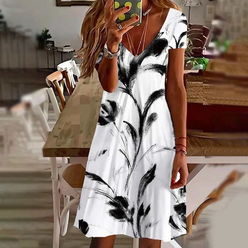 Eleganckie damskie sukienki z dekoltem w serek z nadrukiem