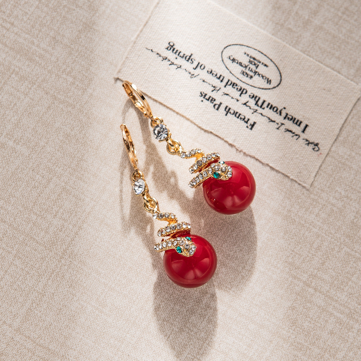 🐍Specjalna oferta noworoczna🎀 Kolczyki z pozłacanej perły w kształcie węża