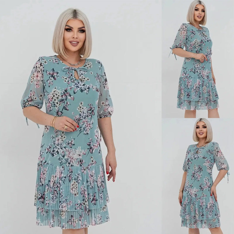 Elegancka damska sukienka plisowana z krótkim rękawem i długą spódnicą