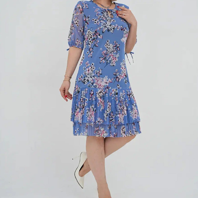 Elegancka damska sukienka plisowana z krótkim rękawem i długą spódnicą