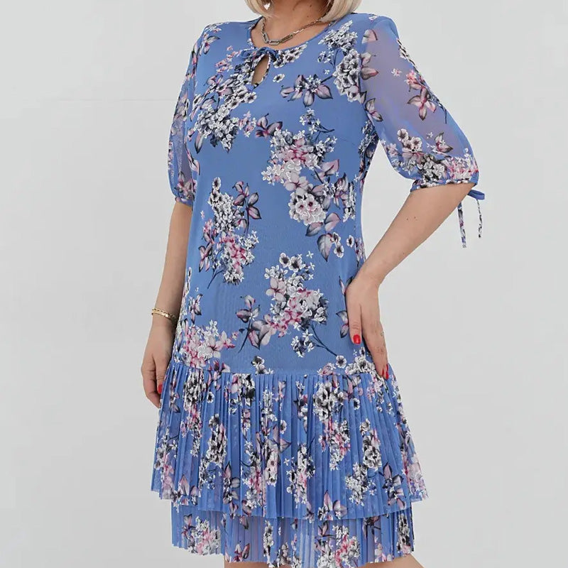 Elegancka damska sukienka plisowana z krótkim rękawem i długą spódnicą