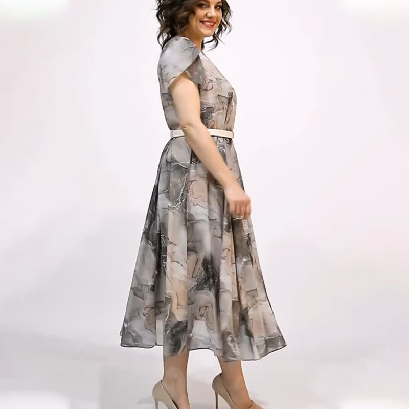 Elegancka damska sukienka midi z okrągłym dekoltem i krótkim rękawem